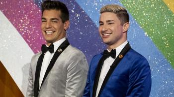 Gayme Show TV show: Matt Rogers and Dave Mizzoni wear velveteen lounge suits against a glitzy background