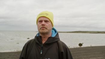 Rainn Wilson and the Geography of Bliss TV screenshot: Rainn Wilson on a beach