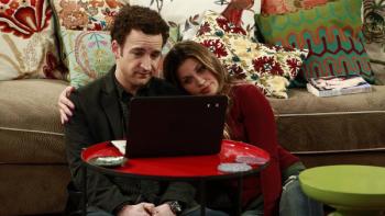Girl Meets World: Corey and Topanga are sitting in the floor in front of a laptop