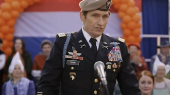 Going Dutch screenshot 1: Colonel Patrick Quinn speaks to a crowd. 