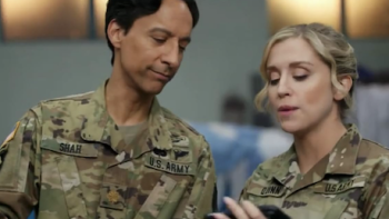 Going Dutch screenshot 2: Major Abraham Shah looks at something with Captain Maggie Quinn.