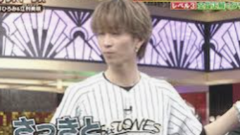 Golden SixTones TV show screenshot 2: Juri Tanaka in white and black baseball jersey during quiz game.