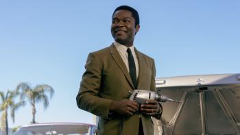 Government Cheese: Chambers holds his precious invention, the self-sharpening drill