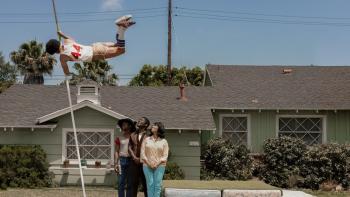 Government Cheese: the Chambers family watches eldest son Einstein practice pole vaulting