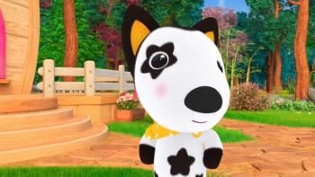 Coo smiles in front of a house with a fence in the forrest.