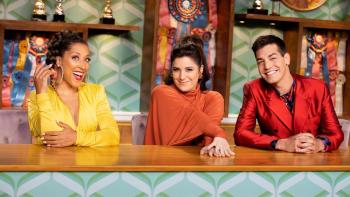 Haute Dog TV Show: Judges Robin Thede and Jess Rona, and host Matt Rogers smile from the judges table