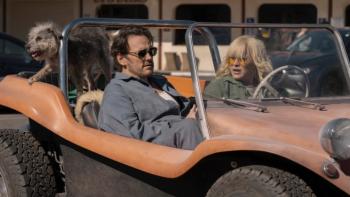High Desert: Peggy is at the wheel of an orange dune buggy with Denny in the passenger seat; a scruffy dog is standing on the back seat