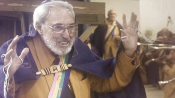 How I Escaped My Cult screenshot 3: Church of Yahweh leader Yisrayl Hawkins raises hands while proselytizing. 