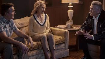 Hysteria! TV show screenshot 3: Dylan's parents Linda and Gene sit on their couch, listening intently to Chief Dandridge.