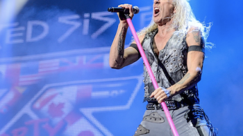 I Wanna Rock TV show screenshot 1: I Wanna Rock Screenshot 1: Dee Snyder with long hair sings on stage. 