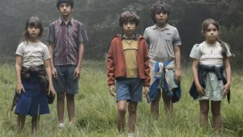 I'm Not Afraid TV show screenshot 1: five children stand at a threshold