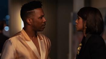 Imperfect Women TV show screenshot 3: Donovan and Eleanor stand close together in a darkened living room, having an intense conversation