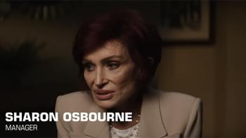 nto the Void TV show screenshot 1: Sharon Osbourne is pictured in a khaki-colored blazer, pictured from the shoulders up and looking offscreen.
