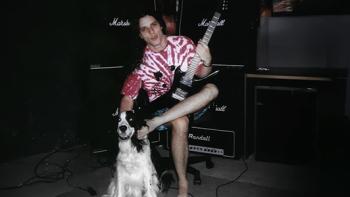 nto the Void TV show screenshot 2: Chuck Schuldiner of the band DEATH is shown in an old candid photo, sitting with legs crossed. 
