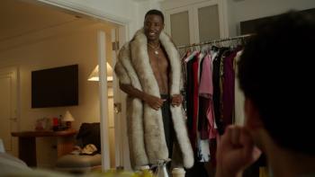 Jerrod Carmichael Reality Show TV show screenshot 1: Carmichael tries on a fur coat for the Emmys