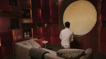 Love is Blind: Japan TV Show: Contestant is kneeling in one of the pods.