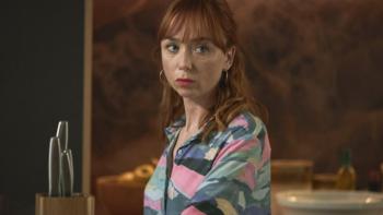 Little Disasters TV show screenshot 2: Mel is in the center of this shot, staring at something off-camera with an upset expression