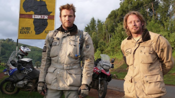 Long Way Down TV show screenshot 3: Ewan McGregor and Charley Boorn stand by Kenyan equator sign. 