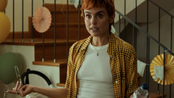 Love You To Death screenshot 2: Marta talks during a party. 