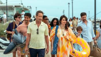 Malice TV show screenshot 1: The Tanner family, Jules, Damien, Milly, and Adam all walk to the beach carrying floaties and towels