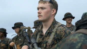 Marines TV show screenshot 2: Marine sniper Logan Roosduring a training exercise. 