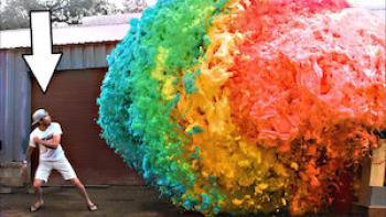 Mark Rober's CrunchLabs TV show: Mark stands next to rainbow 'elephant toothpaste'