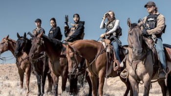 Marshals TV show screenshot 2: Kayce Dutton and the team side by side on horseback. 