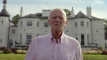 Matchroom: The Greatest Showmen TV show screenshot 1: Barry Hearn stands in front of his white mansion and offices.