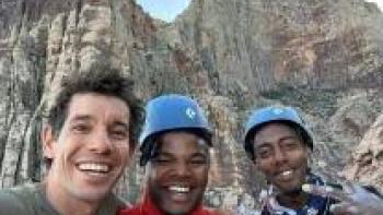 Memphis to the Mountain TV show screenshot #3: three people smile with a mountain peak behind them