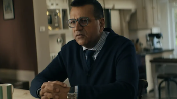 Michael Jackson: The Verdict TV show screenshot 3: Martin Bashirat a kitchen table, looking thoughtful with hands clasped.