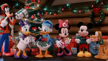 Mickey's Christmas Tales TV show screenshot: Mickey and his friend stand side by side in a house decorated for Christmas, putting presents around a Christmas tree.