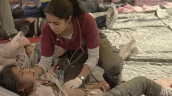 Midnight Family screenshot 1:Marigaby treats a woman. 