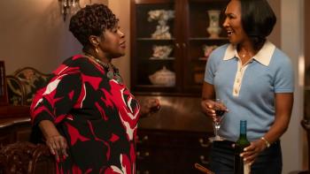 Miss Governor: Jo Marie Payton and Terri J. Vaughn talk with each other in their dining room. 