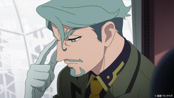 Mobile Suit Gundam GQuuuuuuX TV Show: Challia Bull puts his finger to his temple, while deep in thought