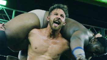 Monster Factory TV show screenshot 1: wrestler Goldy carries a man on his shoulders
