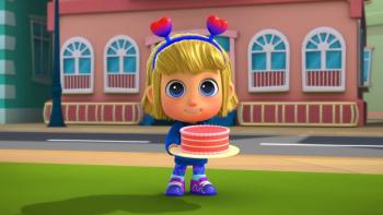 Morphle Shorts TV: Mila wears a heart-shaped hair bow and holds a birthday cake in the garden outside.