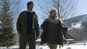 Mosaic Series: A man and a woman are walking together in front of a snowy background; the woman is smiling at the man. 