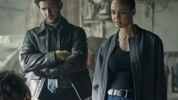 Neagley TV show screenshot 3: Det. Hudson Riley stands with arms crossed next to Neagely.