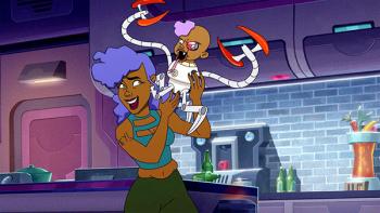 Sunny stands in a kitchen, holding aloft a cyborg baby with robotic spider legs