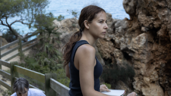 Past Lies screenshot 2: Paula (Irene Escolar) looks out at cave.