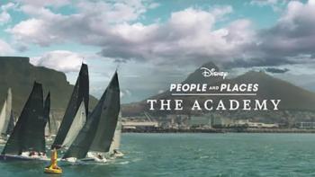 Image from the People & Places episode The Academy shows a handful of yachts in the water at lower left, with a background of small mountains