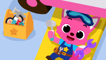 Pinkfong Car Mechanic TV show screenshot: A pink cat in mechanic gear is laying under a car next to a tool box and smiling.