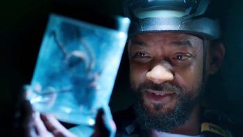 Pole to Pole with Will Smith TV show screenshot 2: Will Smith holds a transparent container with a giant tarantula inside.