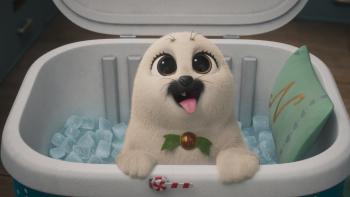 Prep & Landing The Snowball Protocol TV show screenshot 3: Eggnog, a white baby otter, peaks out of an igloo container filled with ice and a pillow.