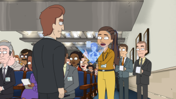 President Curtis TV show screenshot 3: At a political meeting, Banks holds a device that shows a hologram of O'Doyle