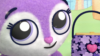 Princess Penelope's Purse of Preposterous Things TV show screenshot 1: Ultra close up of Penelope and her purple purse.