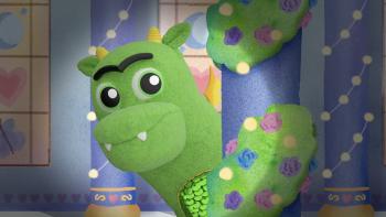 Princess Penelope's Purse of Preposterous Things TV show screenshot 3: A dark vignette reveals a green dragon spying from behind a wall.