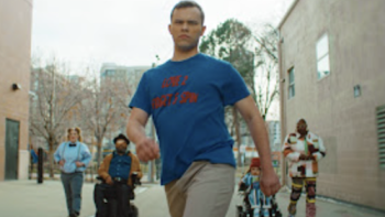 Reframed: Next Gen Narratives TV show screenshot 2: Josh Allege as Jack wears blue shirt and walks.