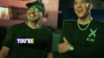 Reggaeton: The Sound that Conquered the World screenshot 1: Daddy Yankee and friend check out their old neighborhood in Puerto Rico.