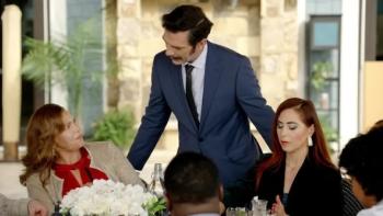 Scare Tactics TV show screenshot 2: A waiter in a blue suit stands tableside, leaning in and speaking to two female diners